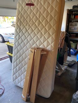Twin size mattress and support boards