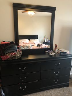Black dresser with mirror