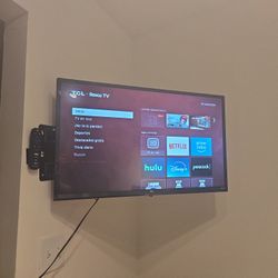 TCL Roku Tv  with movable wall mount  included 