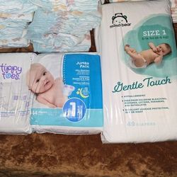 2 Packs Of Baby Diapers 