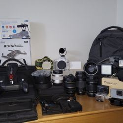 WHITE CANON EOS REBEL Sl2 DSLR CAMERA EXTRA LENS AND MORE.