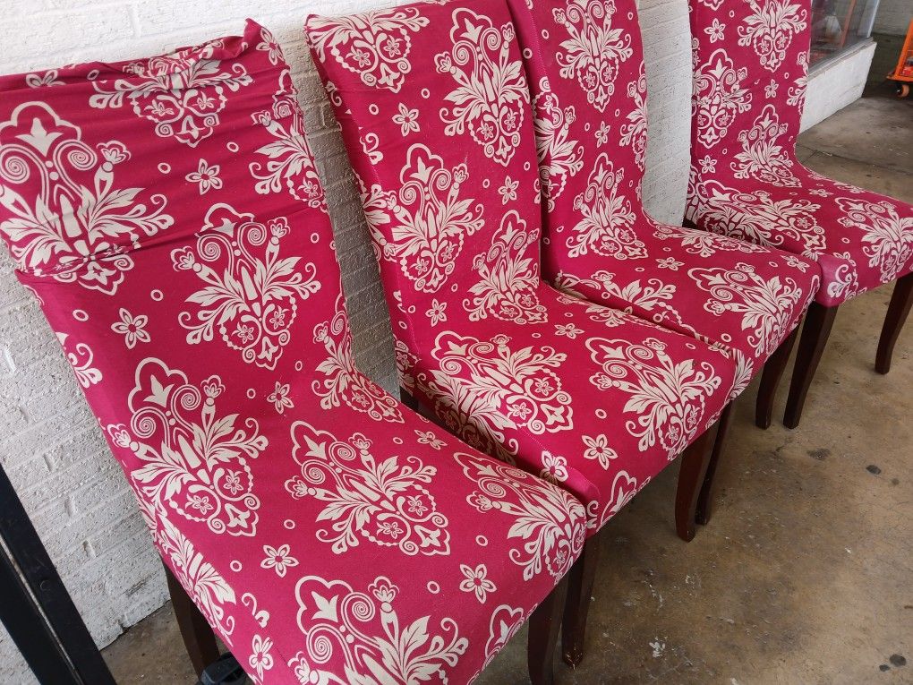 4 Cloth Chairs They Have Covers