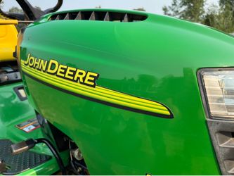 John Deere Riding Mower, bagger, mulch or side cast
