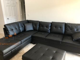 Brand new black faux leather Sectional Sofa with storage chaise and storage ottoman