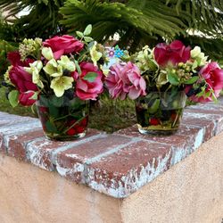 Set Of Artificial Flower Arrangement In A Glass Vase