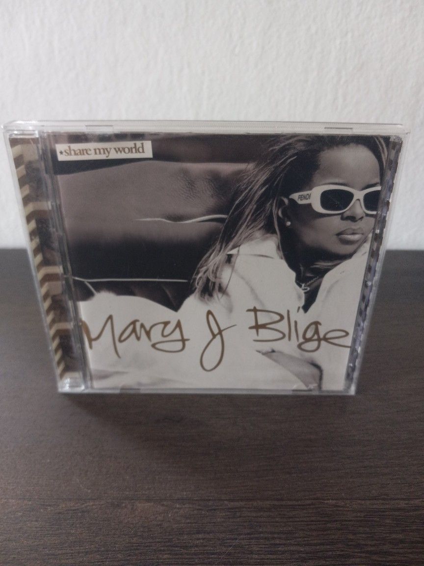1997 Mary J Blige Share My World Cd. Preowned but great condition all around. The cd is in like new condition.  The case is in great condition but it 