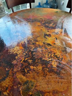Arhaus copper top dining table