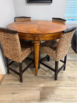 Round wood table with 4 chairs