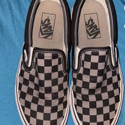 Black and grey checkered vans