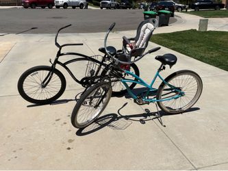 2 Beach Cruisers (1) with child seat and trailer mount
