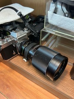 Nikkormat 35mm Film Camera with Vivitar Telephoto Lens