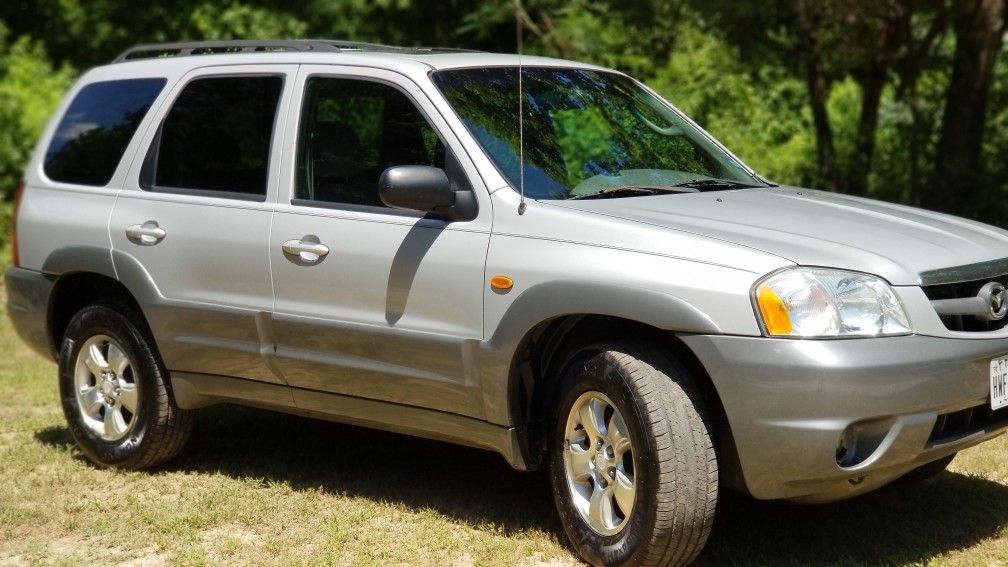 2002 Mazda Tribute 2WD 3.0L FI DOHC 6cyl.