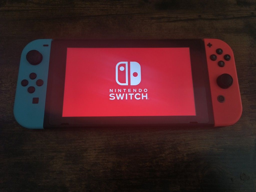 Nintendo Switch (2017 Launch Model) – Console + Joy-Cons Only