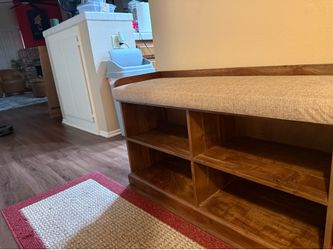 Padded bench with storage for shoes