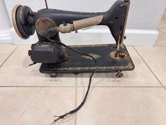 Singer sewing machine antique . Looks a great piece for decoration .