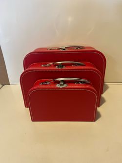 decorative red suitcase nesting boxes are designed for storing keepsakes