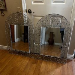 2 Mirrors , of iron metal.