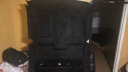 Headliner with molded roof rack