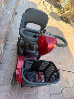 Red Electric Mobility Scooter with Basket