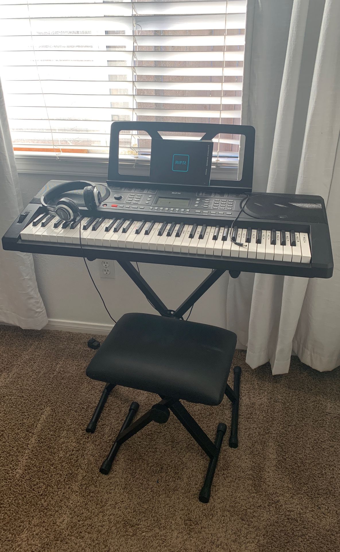 RIF6 keyboard with headphones, stool, and stool