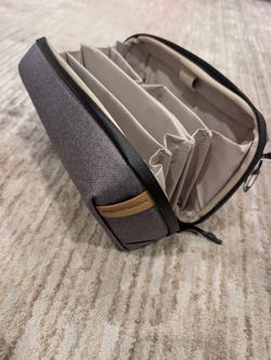 Gray zippered travel pouch tech organizer bag