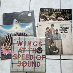 The Beatles and Beatles related vinyl records and cassette tapes John Lennon Paul McCartney George Harrison