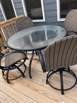 Table - patio - four swivel chairs $500