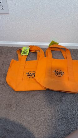 2 brand new orange Trader Joe’s bags