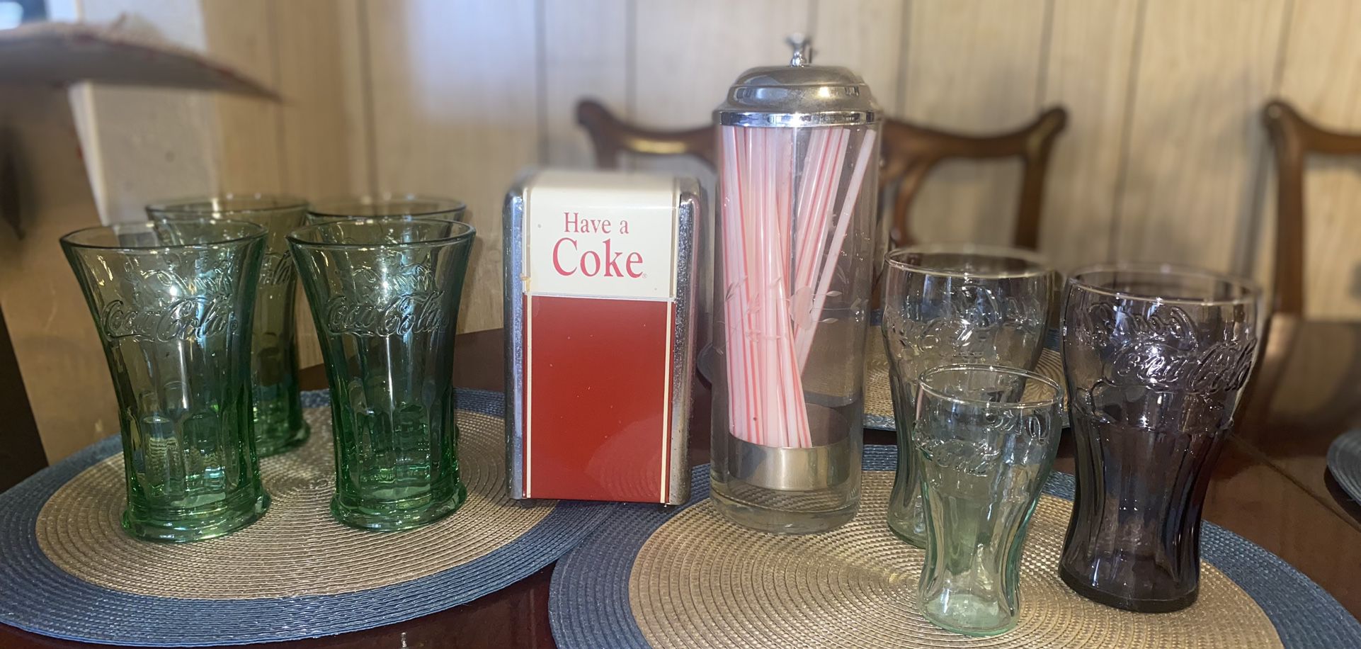 Take Off For $40. The Container Glass Is Print House With The Straws.