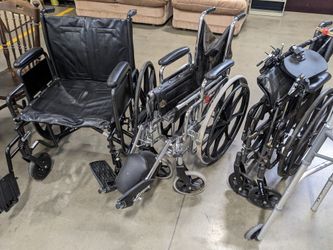 Three Wheel Chairs And A Walker