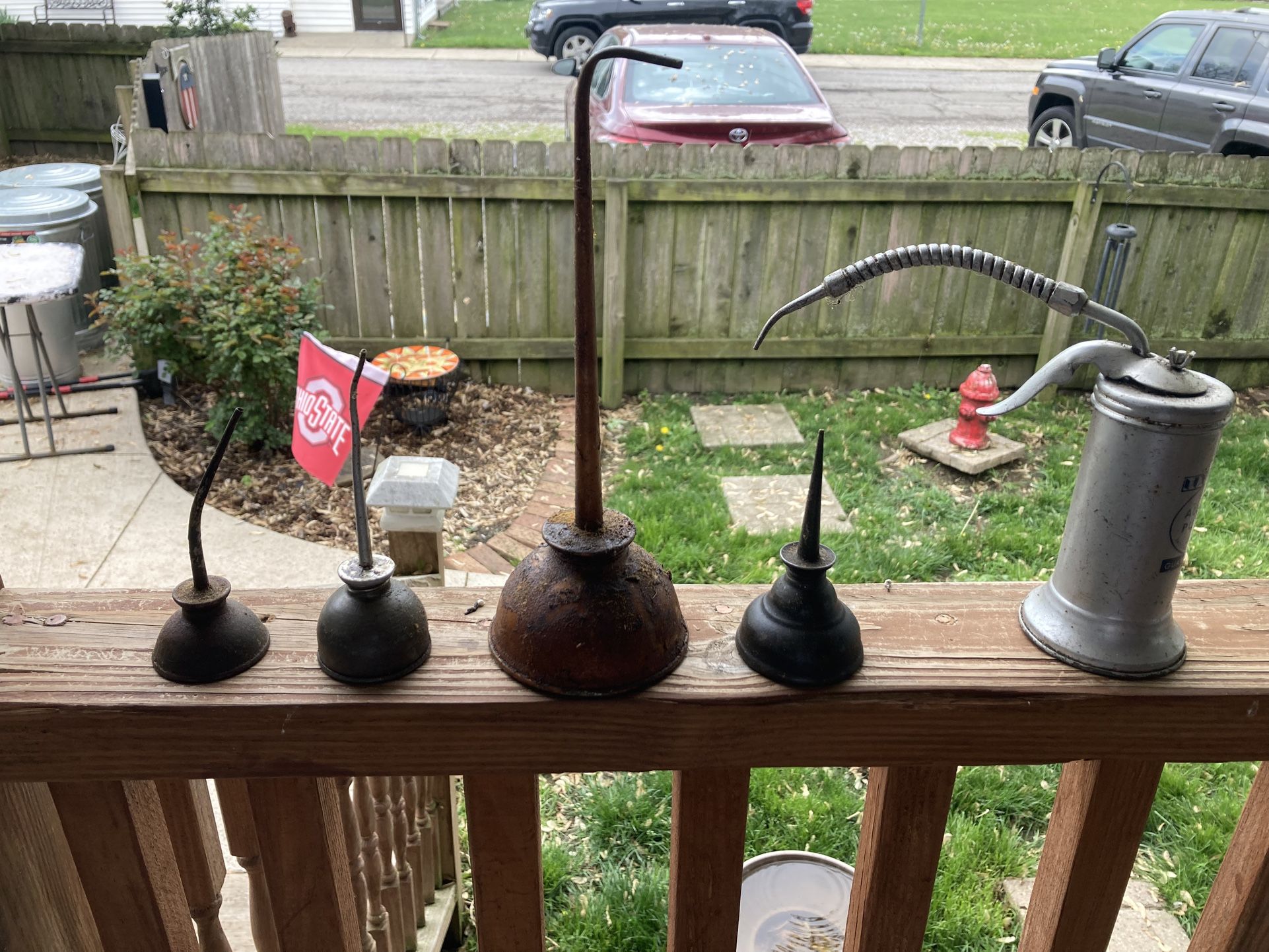 Set of 5 Vintage Oil Cans. They need wiped off. (Johnstown Ohio)