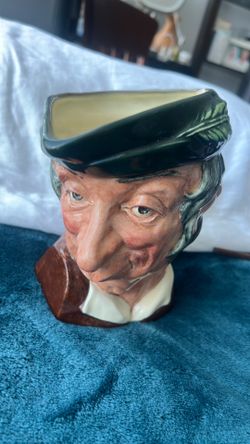 A Royal Doulton 'Simple Simon' large character Toby Jug, model D6374.