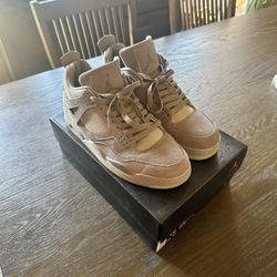 KAWS x Air Jordan 4 Retro 'Cool Grey'