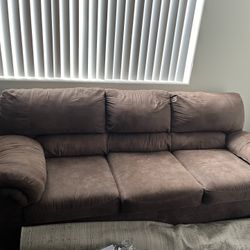 BROWN COUCH WITH PULL OUT BED