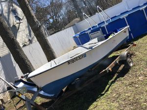 Photo 14 foot fiberglass boats/ trailer