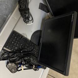Two monitors a keyboard and a mouse