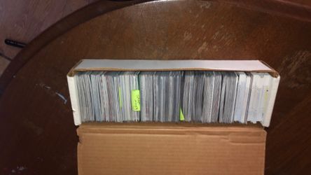 100+ baseball cards and football cards