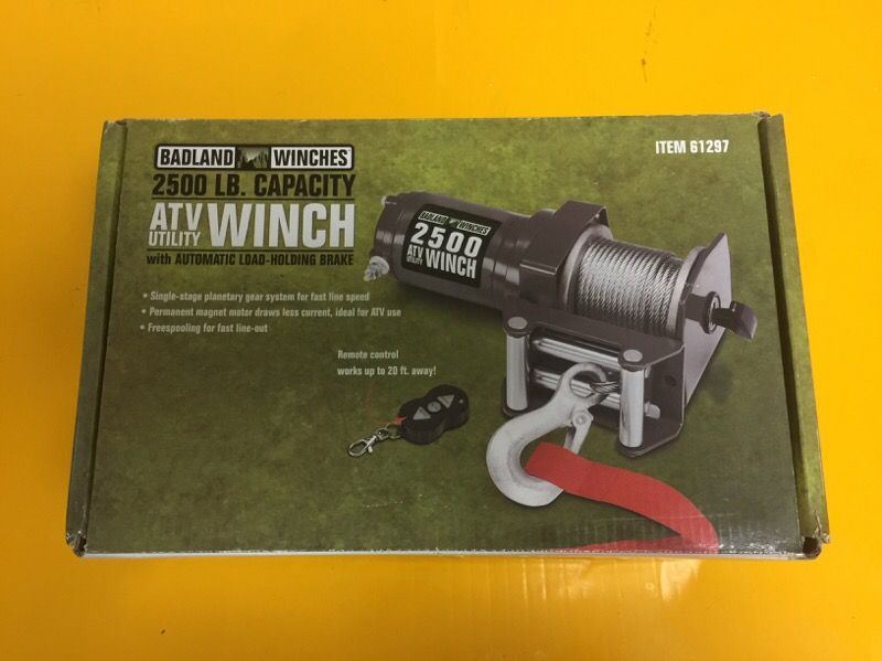 Badland Winch 2500 lb. ATV/Utility Electric Winch with Wireless Remote Control... BRAND NEW BEEN NEVER USED...