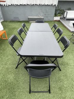 8ft foldable table + 8 black foldable chairs