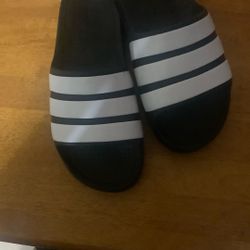 Brand new men size 11 Adidas slippers