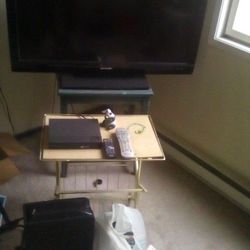 SHARP TV/ OVER 200 MOVIES AND DVDS/BOTH FOR $40