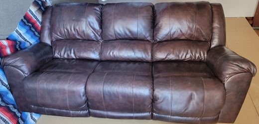 Reclining leather couch and loveseat