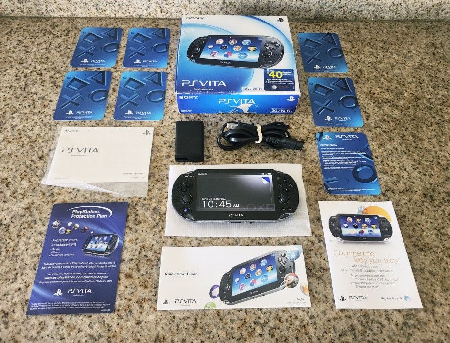 Sony PS VITA OLED complete in box like NEW!!