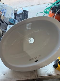 Under mound sinks