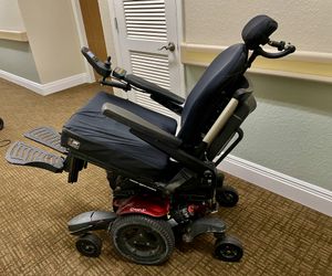 Quickie power wheel chair