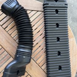 Toilet Tank Lid.  W downspout Extender