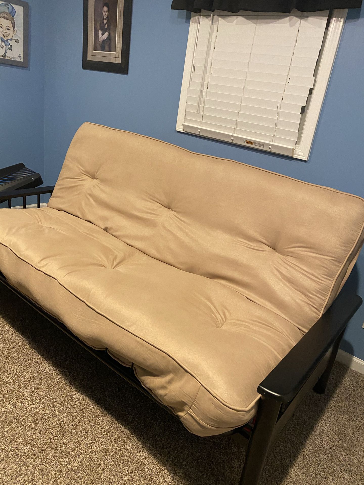 Full size futon and couch. New. Bought - not used. All included