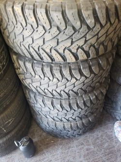 35x13.50x18 toyo open country M/T