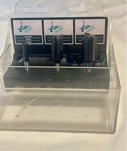 Router bits with plastic case. 1/4 1/2 3/4