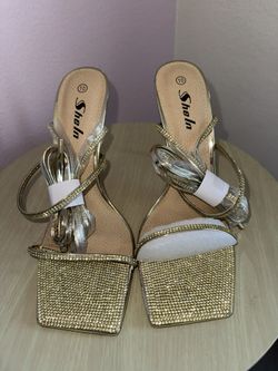 Gold strappy heels